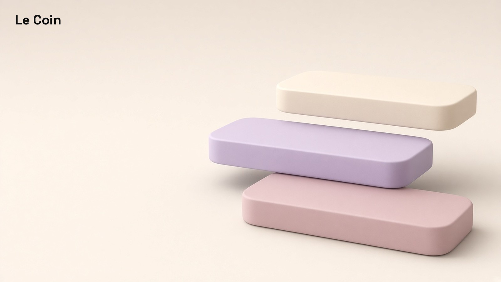Three soft matte glass shelves at clear stepped heights on a seamless cream ground.