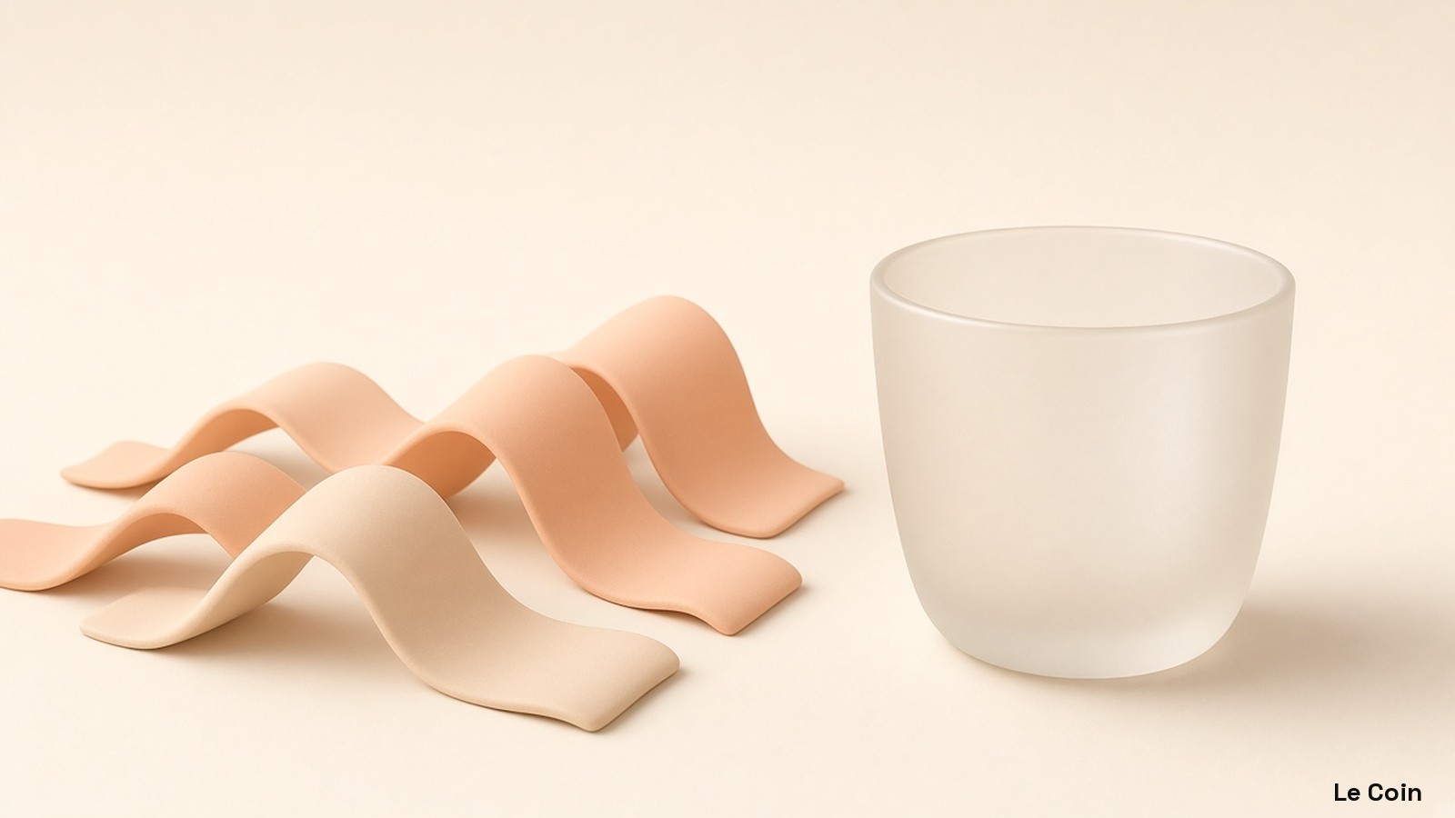 Soft clay ribbons of overnight flow rise beside a still blank cup on cream in warm apricot and peach.
