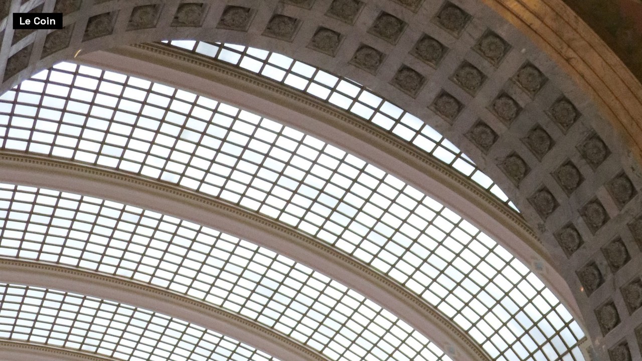 Arched glass skylight and coffered stone vault inside the Utah State Capitol.